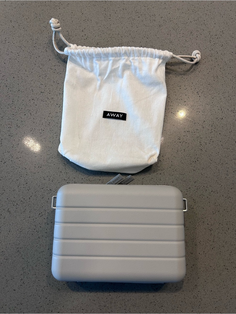 Away Mini Hard Shell Crossbody Bag in Light Gray with White Drawstring Pouch - Picture 2 of 3
